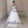 Luxury Lace Princess Ball Gown Wedding Dresses Sheer Neck Illusion Long Sleeves Appliques Country Bridal Dress Vestido De Noiva